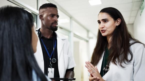 two doctors (white coats)