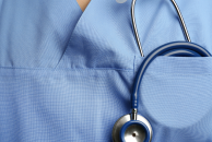 chest of person in scrubs