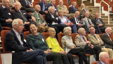 Group of people in lecture chairs