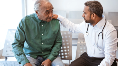 doctor hand on patient shoulder