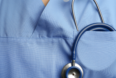 chest of person in scrubs