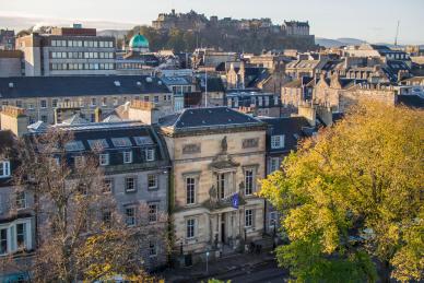 RCPE Building with Edinburgh Skyline in photo