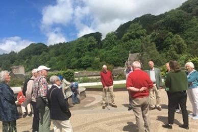 group of people stand in circle
