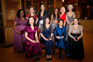 women pose for photo