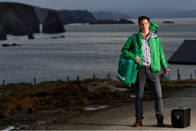 Doctor standing by the sea