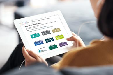 person looks at education portal on a tablet