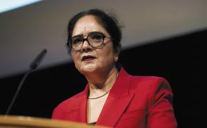 woman speaking at podium