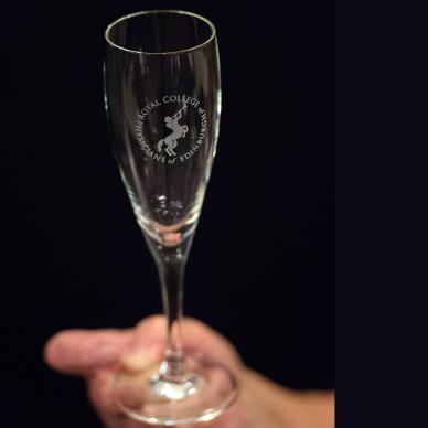 Photo of Glass champagne flute engraved with Chiron emblem