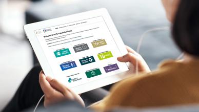 person looks at education portal on a tablet