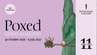 A cloaked plague doctor wearing an emerald green hooded outfit carries a pan of smoildering coals. 